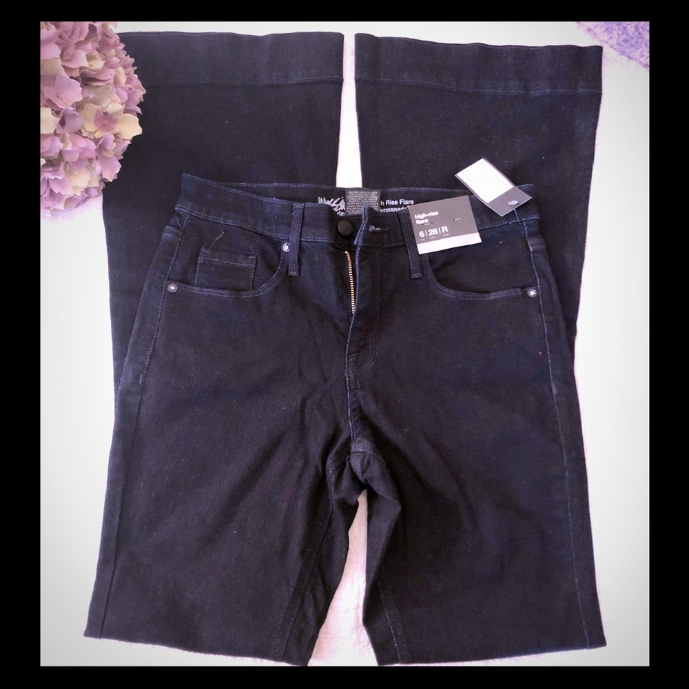 Dark high rise flare super stretch jeans.